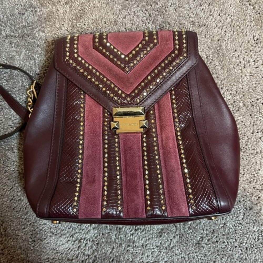 Michael Kors Chic Burgundy Women's Backpack with gold accents